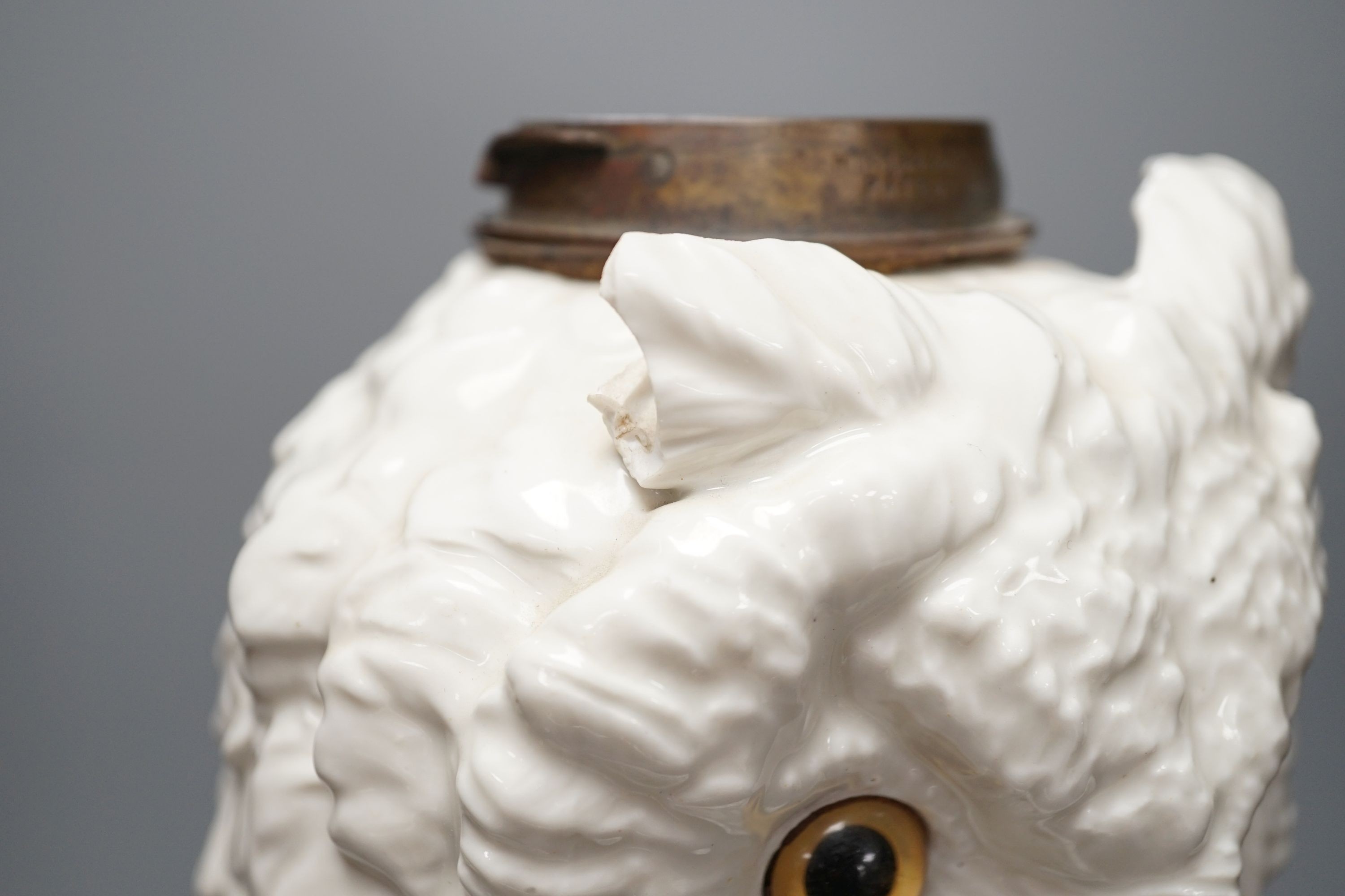 A large late 19th century ‘owl’ porcelain oil lamp base, with Victorian lozenge registration mark to base, probably Sitzendorf, 46 cms high.